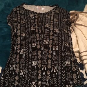 4 shirts and one sweatshirt